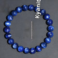Blue crystal ball bracelet with geometric beads and Ruyi design elements on wrist