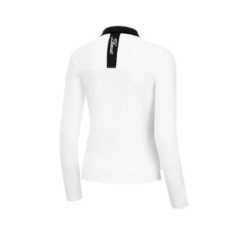 Women's white long sleeve golf top with slim fit polyester construction for outdoor sports