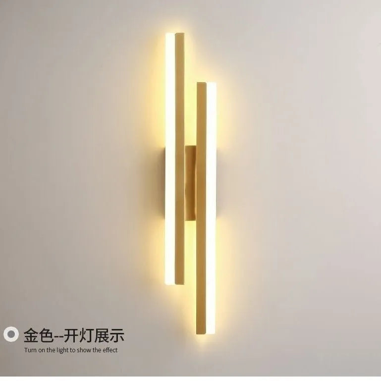 Scandinavian minimalist LED wall light with acrylic shade in black or gold finish, 50cm length