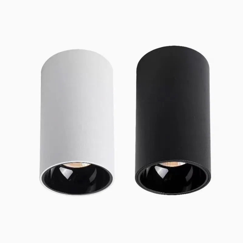 LED surface mounted spotlight in aluminium with anti-glare design, shown in all-black or white and black finish