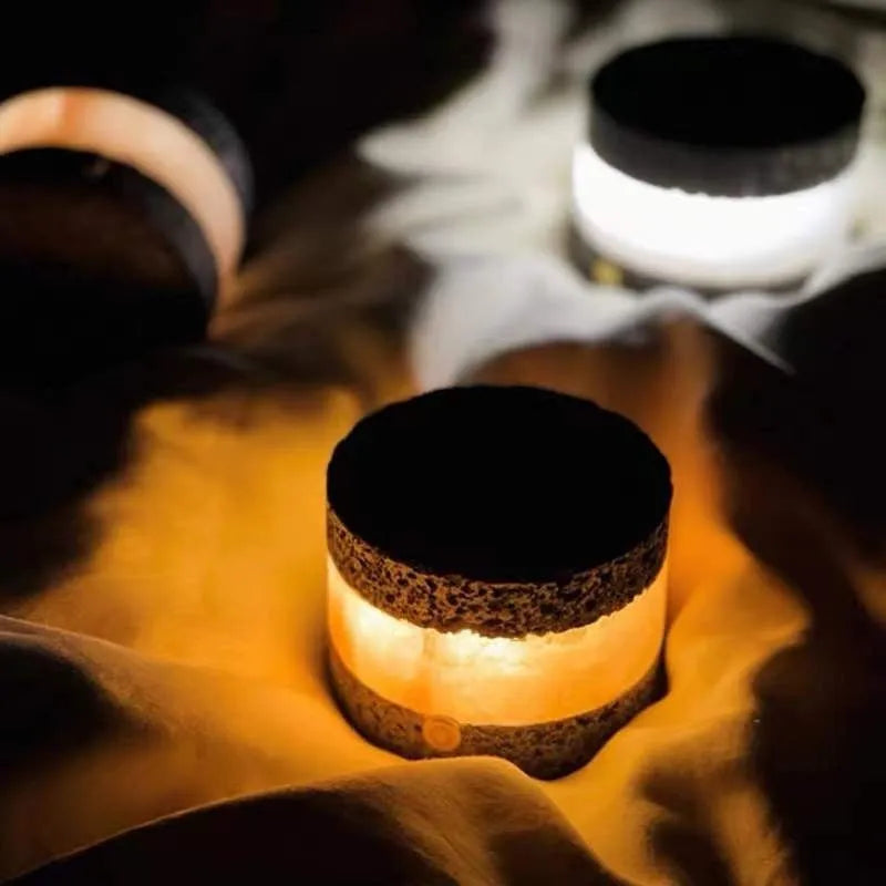 Small orange volcanic rock touch night lamp with USB port and essential oil reservoir.