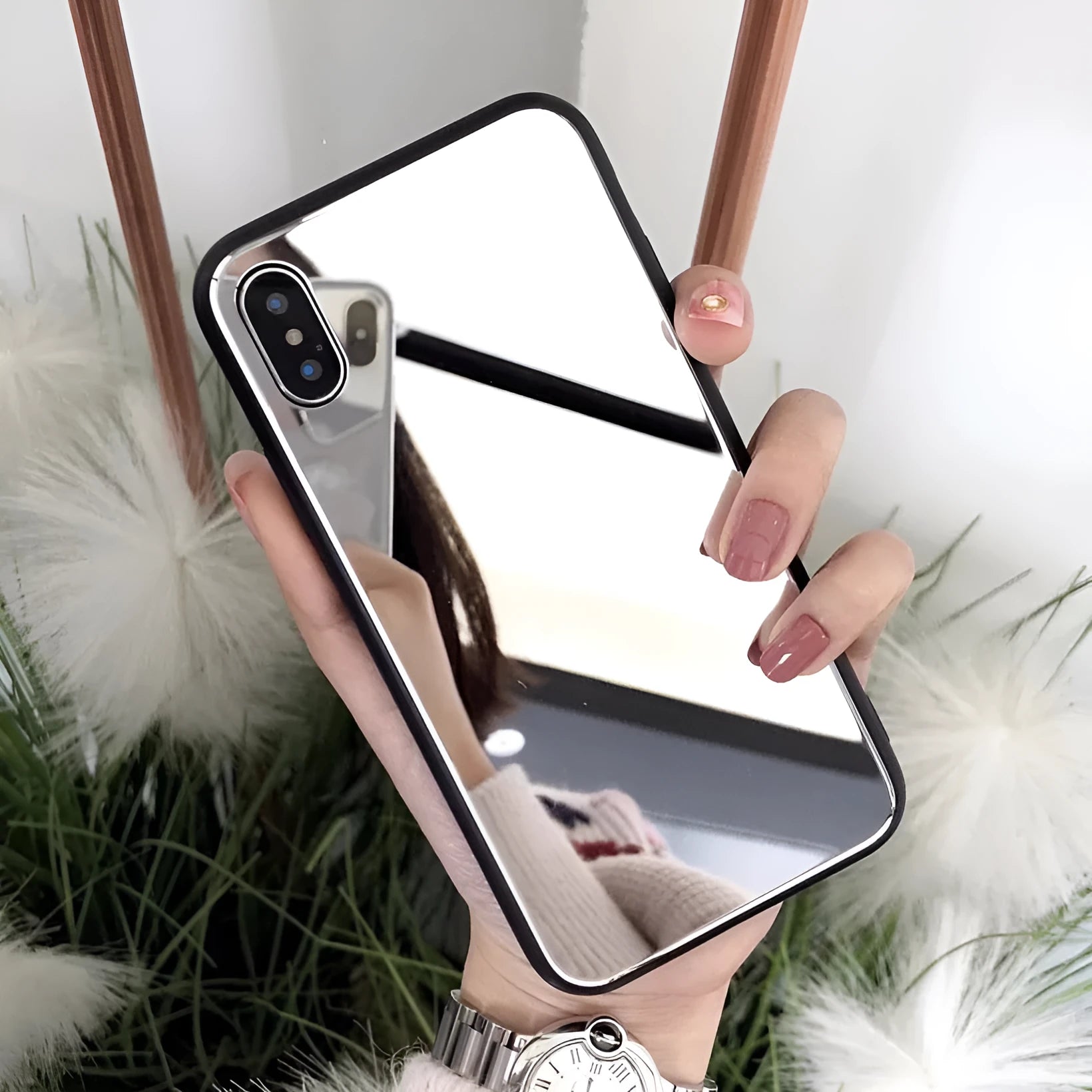 Black mirror back cover case for iPhone showing reflective surface.
