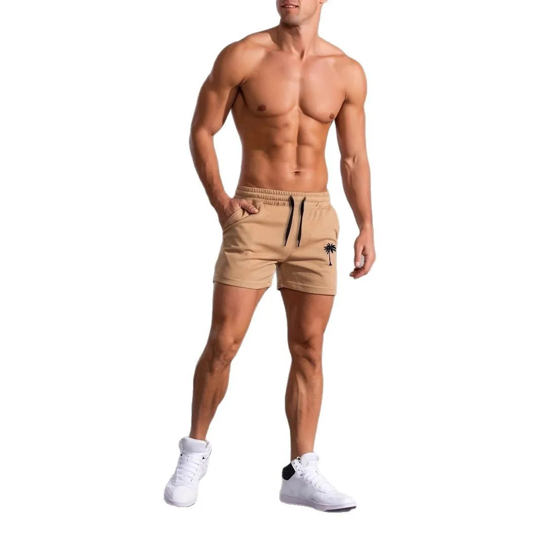 Khaki men's coconut print sports shorts with straight leg and elastic waistband