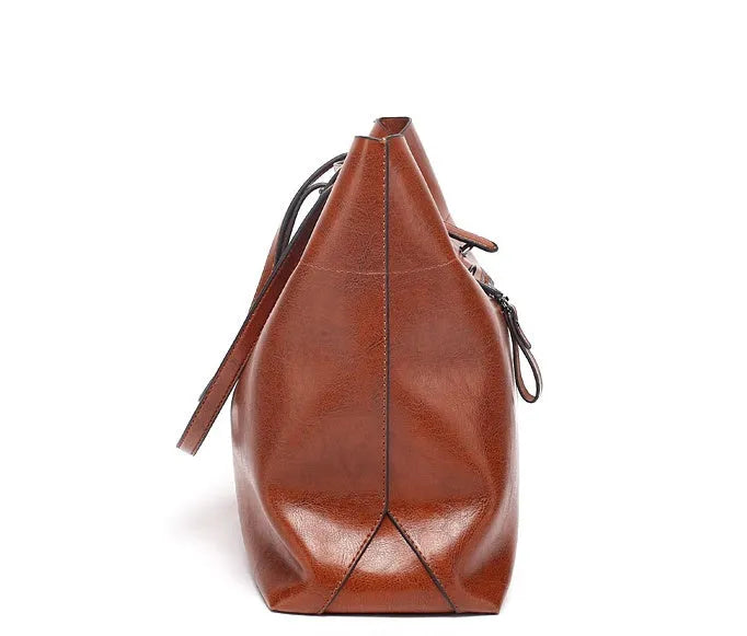 Waxed cowhide leather handbag in cross-section style showing internal compartments and available colour options.