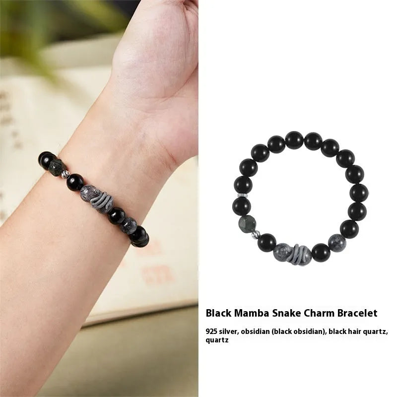 S925 sterling silver snake bracelet with obsidian black hair crystal centrepiece on wrist