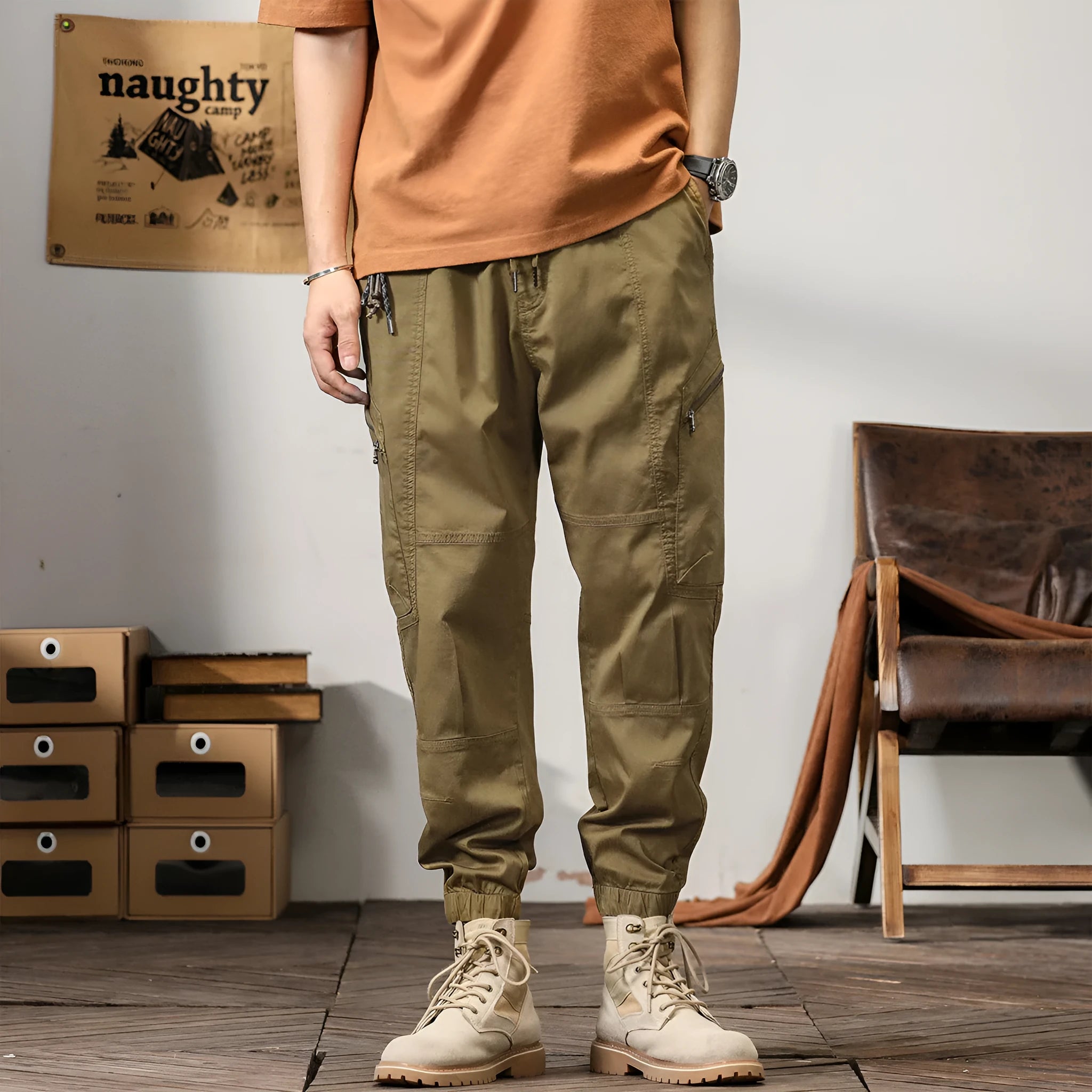 Men's loose-fit cotton harem pants in a solid colour with ankle bands and a mid waist.