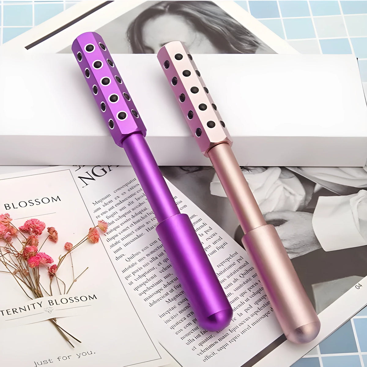 Purple handheld beauty massage roller with germanium particles for facial and eye care