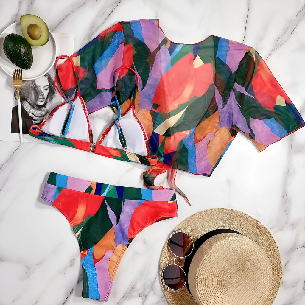 Red printed nylon split swimsuit for women, shown in a briefs-style bikini cut.
