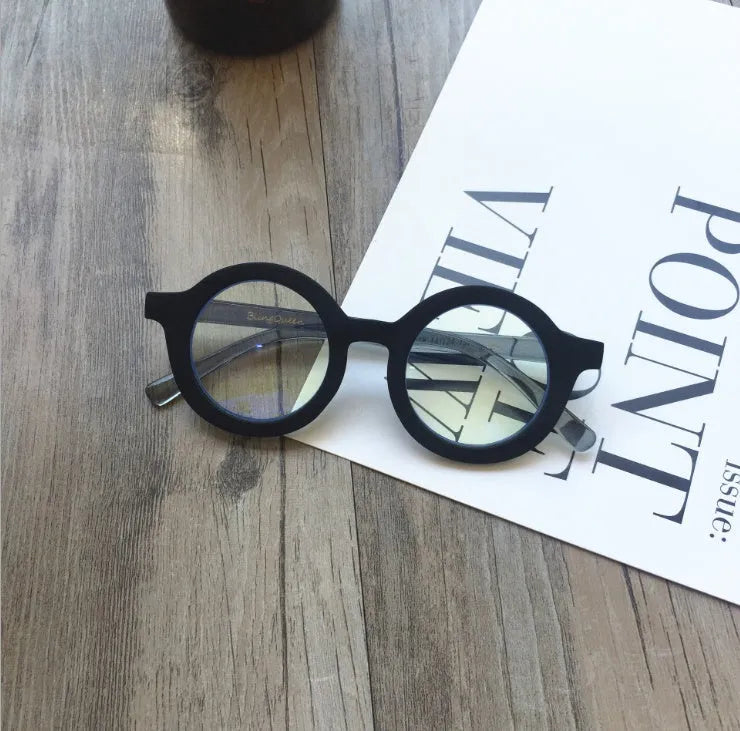 Retro round frame glasses with UV400 lenses in six colour options including black, pink and leopard print