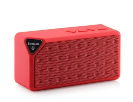 Cannon X3 portable wireless Bluetooth speaker with FM radio in multiple colours on outdoor ground