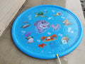 Blue PVC water spray play mat with marine animal designs for outdoor garden use