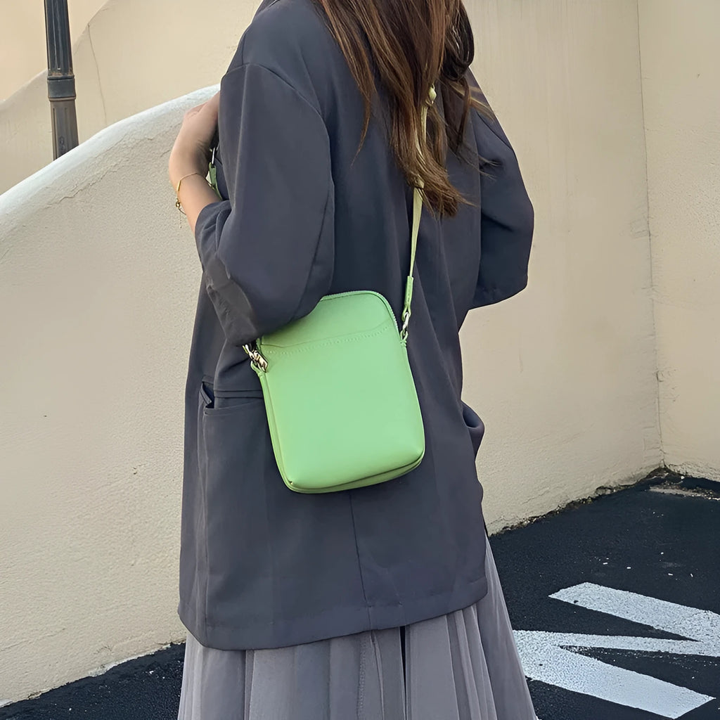 Solid colour mobile phone crossbody shoulder bag for women in PU material showing black, beige, khaki, and green colour options