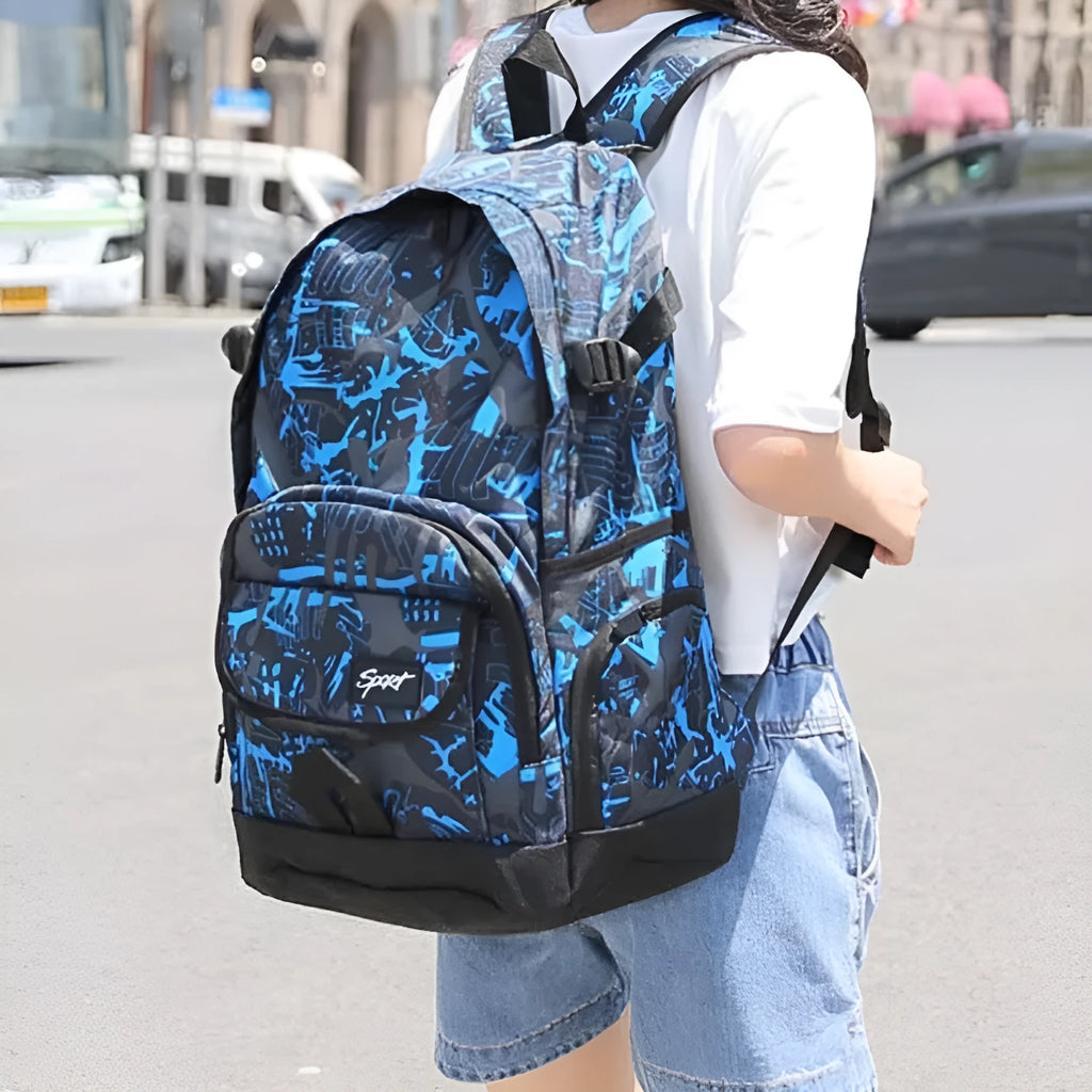 Classic blue and red nylon backpack with large capacity and padded straps.