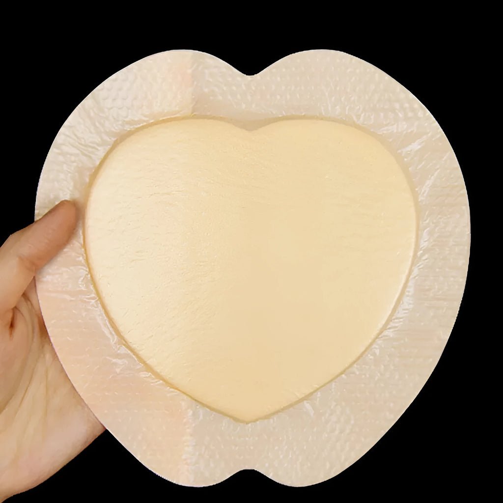 A large skin-coloured silicone gel foam sticker for bedsore prevention on a white background.