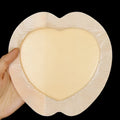 A large skin-coloured silicone gel foam sticker for bedsore prevention on a white background.