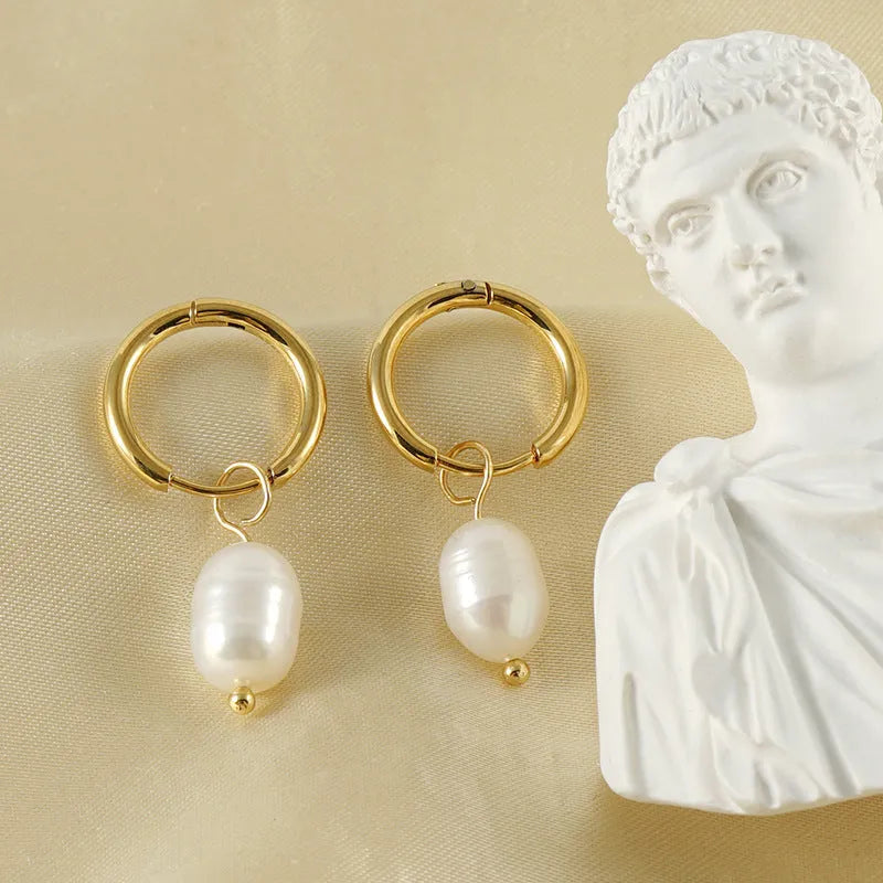 Gold geometric pearl earrings in stainless steel with titanium steel components