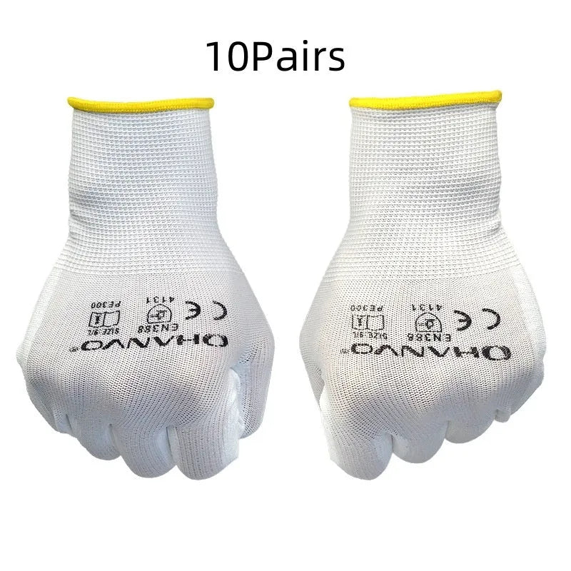 White PU-coated work gloves showing flexible fit and 24 cm length on a workbench.