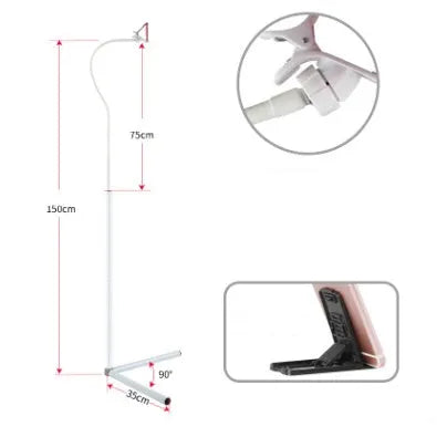 Black mobile phone bed bracket with overhead support shelf mounted for bedside TV watching