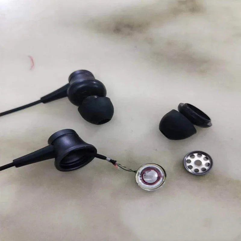 Piston-style in-ear wired headphones with 3.5mm audio jack in black, blue, and red colour options