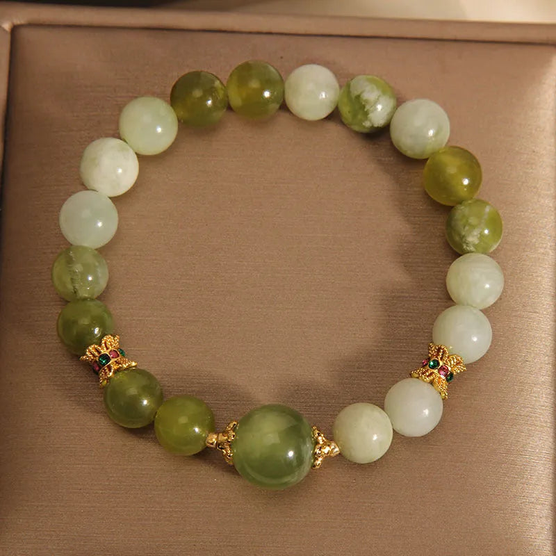 Women's original design jade bracelet in Xiuyan green colour with mori style aesthetic
