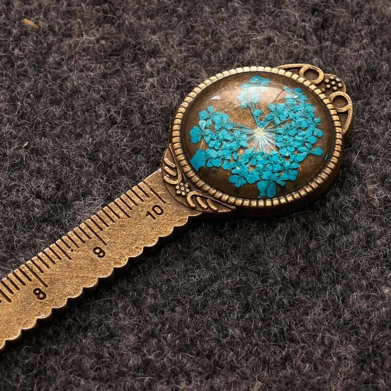Handmade dried flower ruler bookmark with gypsophila, daffodil, lace flower, and clover on 12cm base in multiple colours.