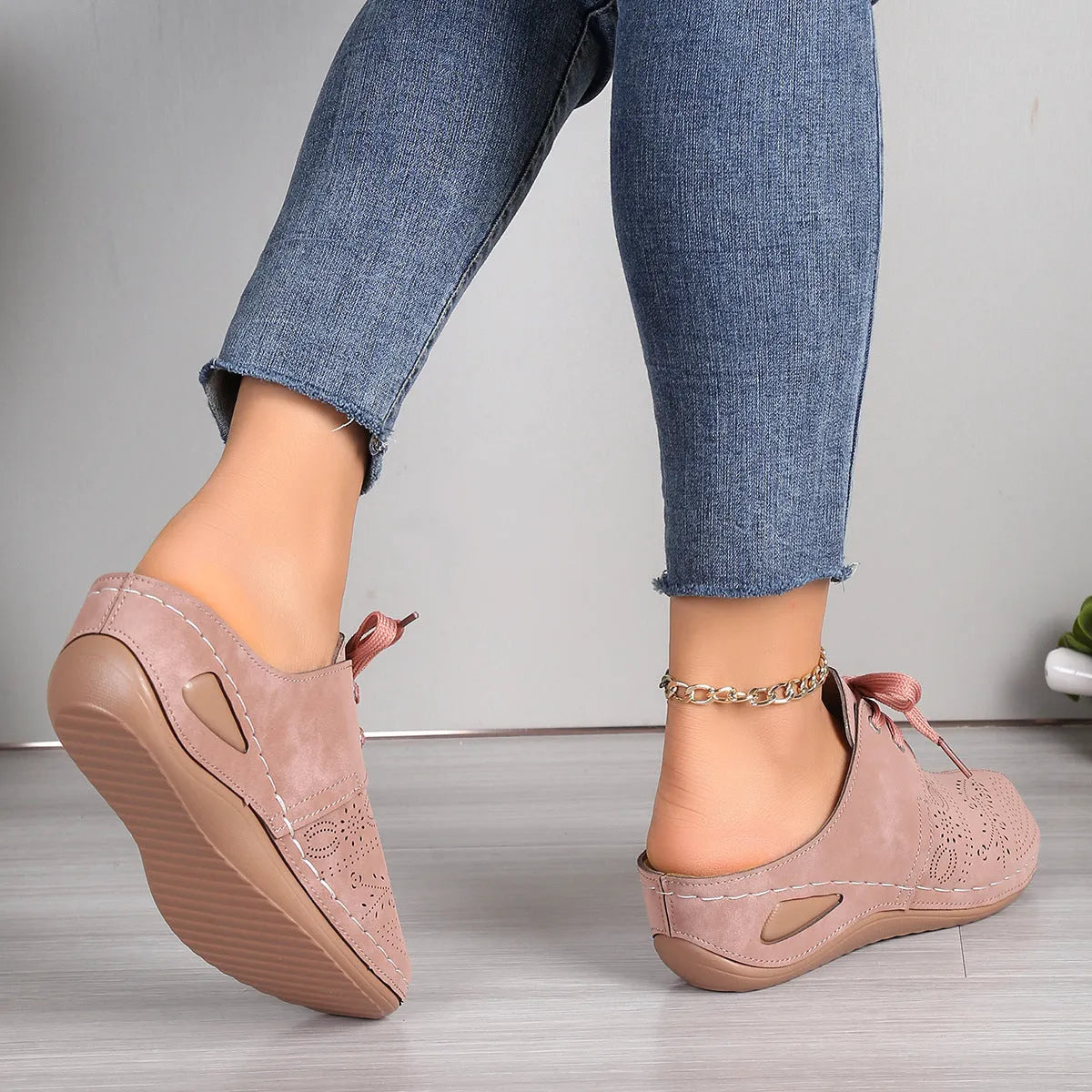 Women's lace-up summer slippers with suede upper, wedge heel, and rubber sole in various colours.