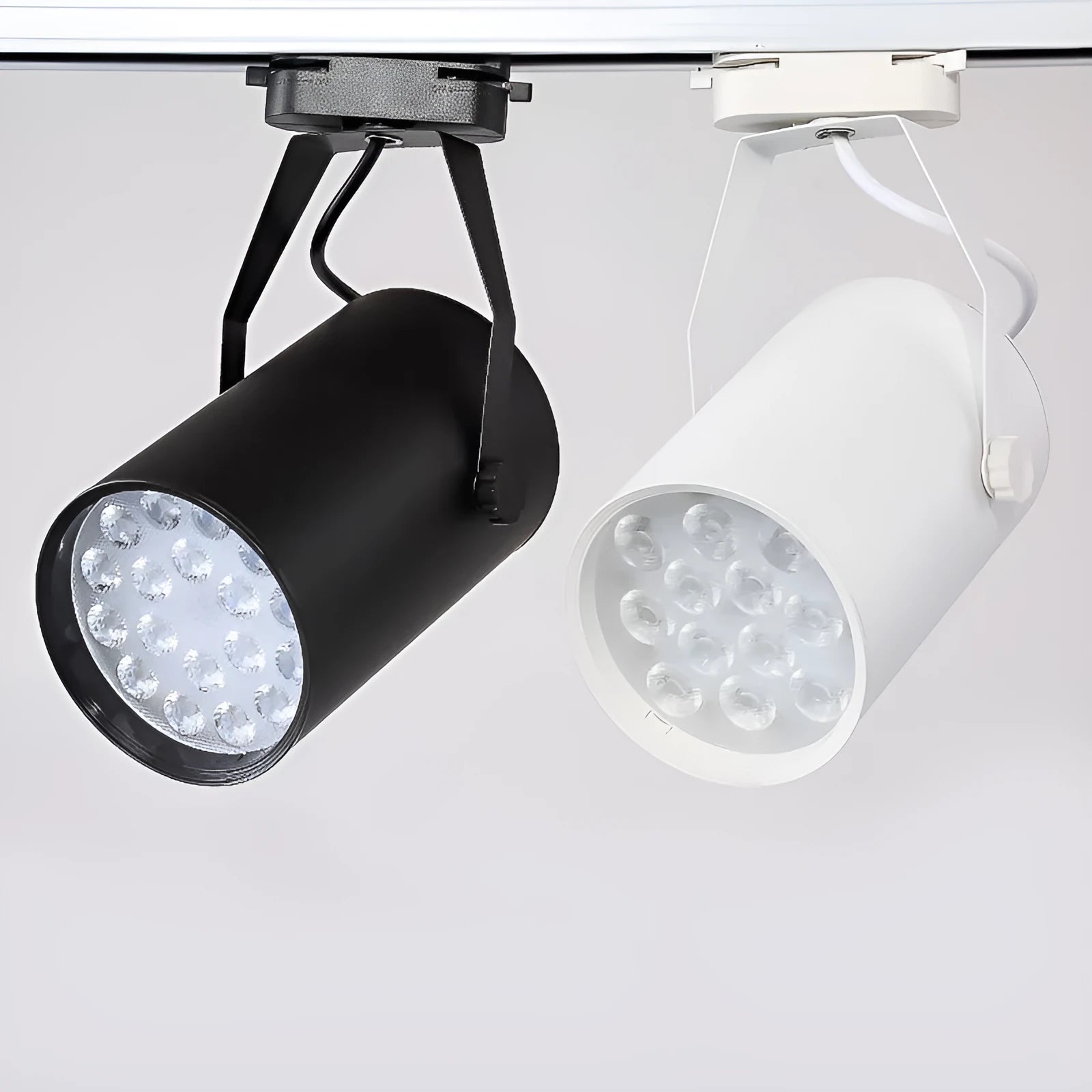 LED track spotlight in aluminium shell for store display wall lighting, showing black and white colour options.