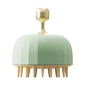 Green pet bath brush with soft bristles and drainage holes for dog and cat grooming