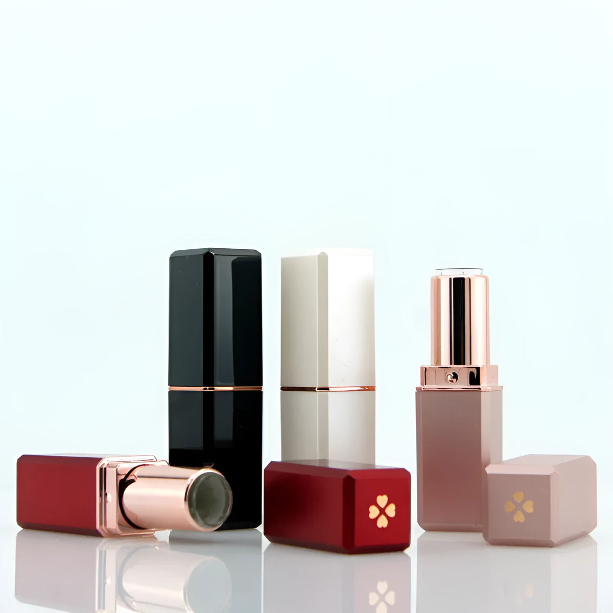 Empty 121 caliber lipstick tube in black, pink, red, or white ABS plastic for DIY cosmetics.