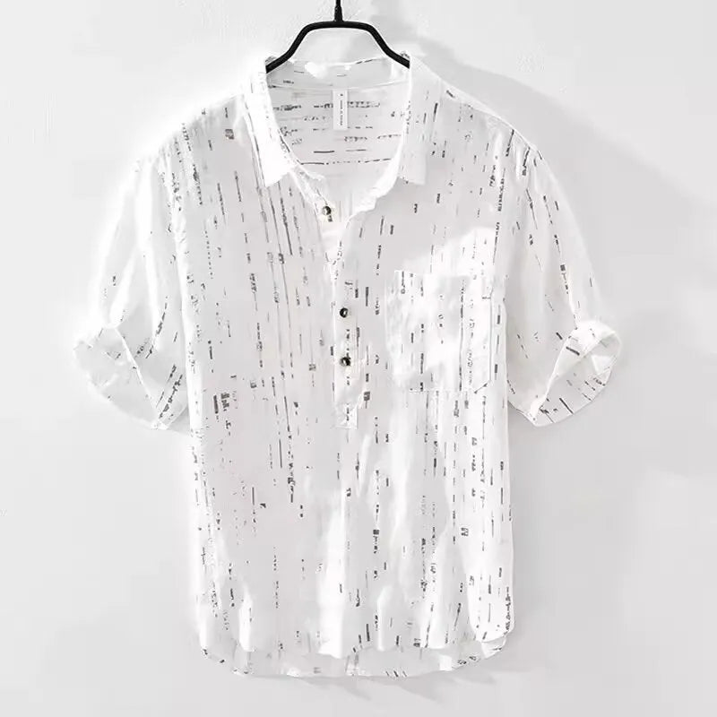 Men's black loose-fit short-sleeved polo shirt with a lapel collar on a hanger.