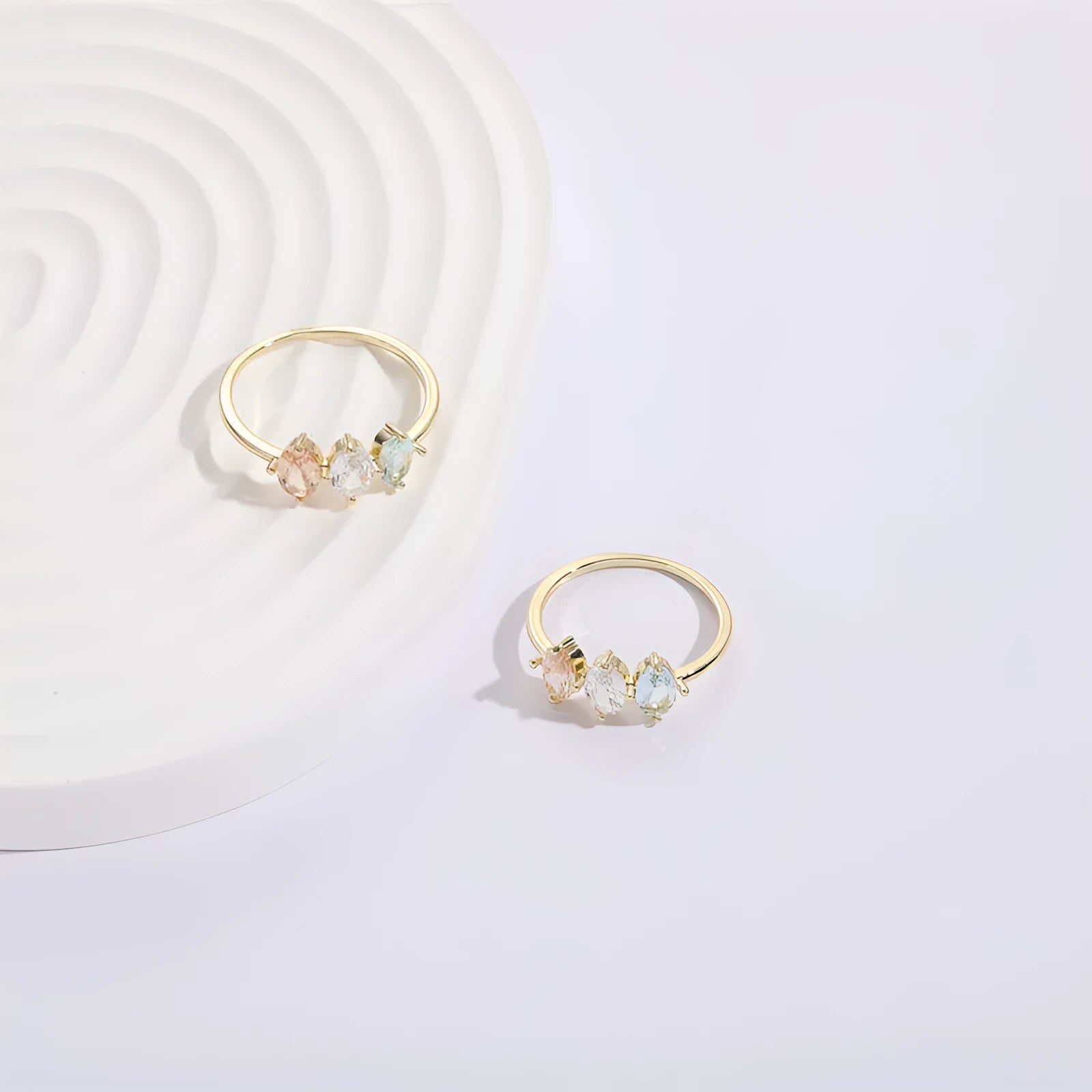 Geometric triangle birthstone ring with horse eye tricolour zircon in gold electroplated finish