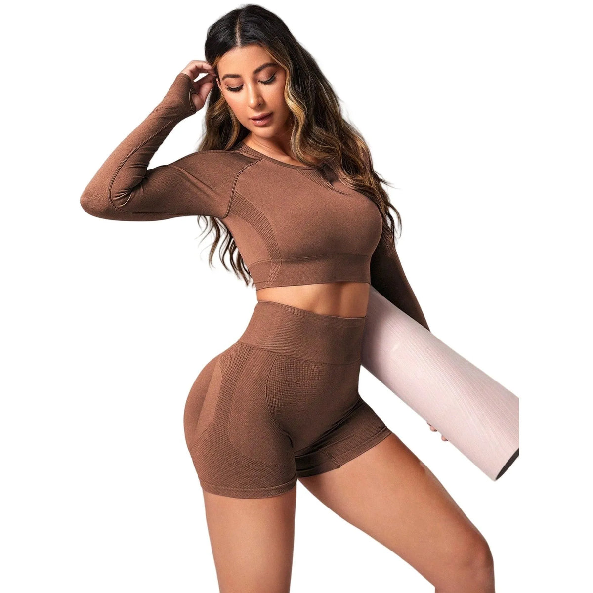 Women's black high-waisted yoga suit with long sleeves and matching trousers