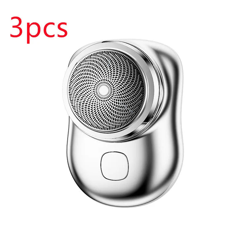 Mini portable USB electric shaver in silver with rotary head, aluminium body, and IPX7 wet and dry use