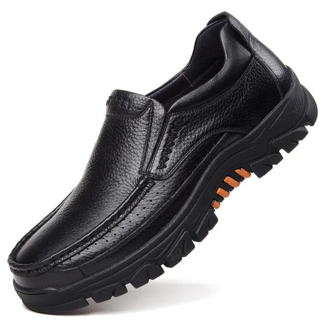 Men's black and brown cowhide leather slip-on business casual shoes with rubber sole.