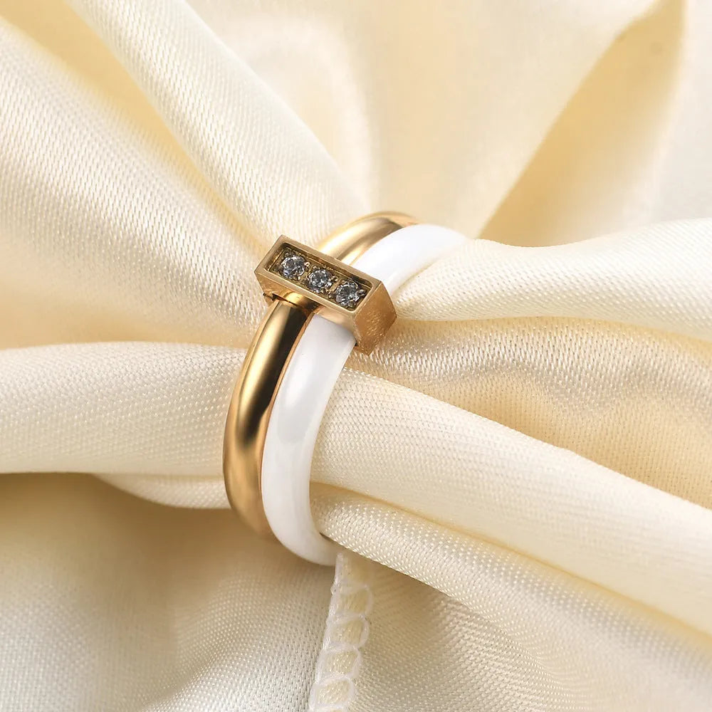 Ceramic geometric ring with glossy stitching and zirconium detail in steel black finish