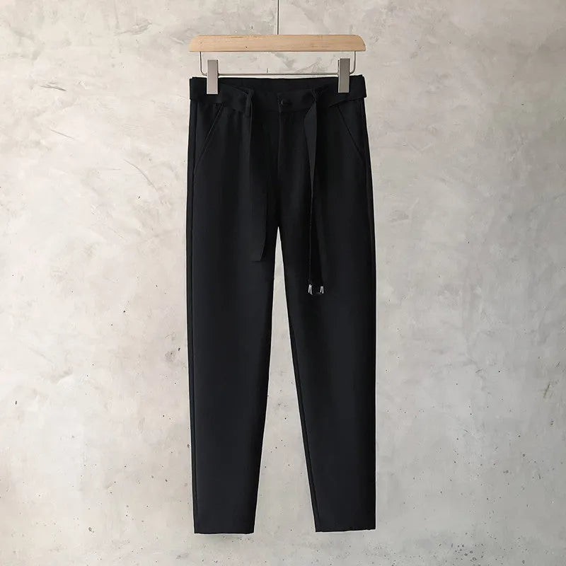 Boys slim straight wool trousers in a tapered cut with a straight leg opening.