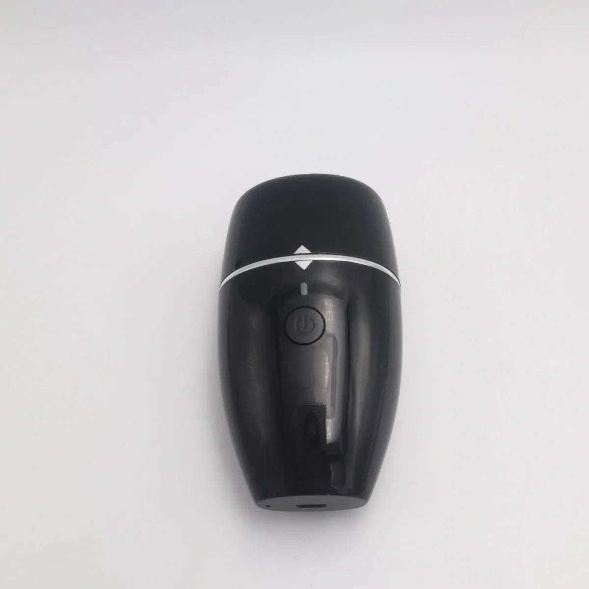 Black and white electric silicone lip plumper device with USB charging cable.