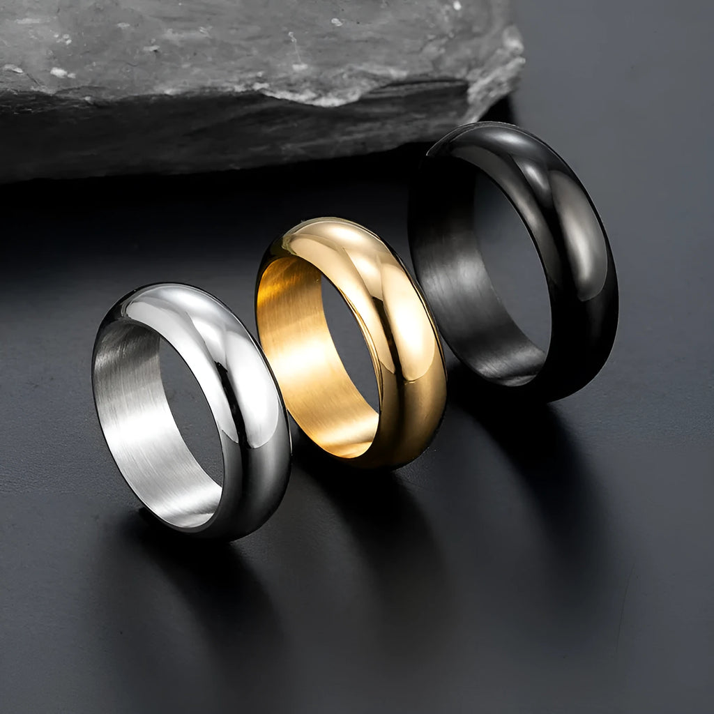 Glossy electroplated titanium steel ring shown in gold, black, and steel colour options.