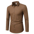 Men's long-sleeve linen shirt in a slim, loose fit on a hanger, shown in a navy blue colour.