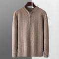Men's grey diamond pattern half-zip wool sweater on a hanger