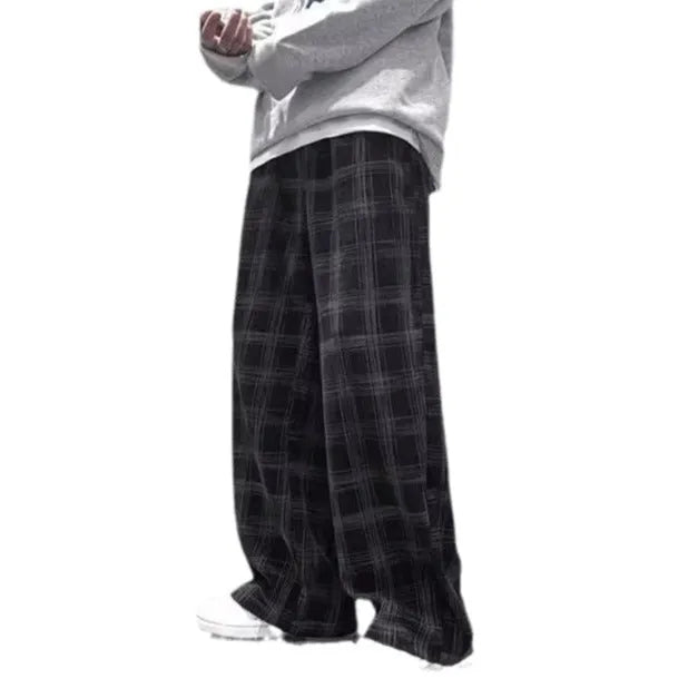 Loose-fit straight-leg plaid trousers in black and green colour options
