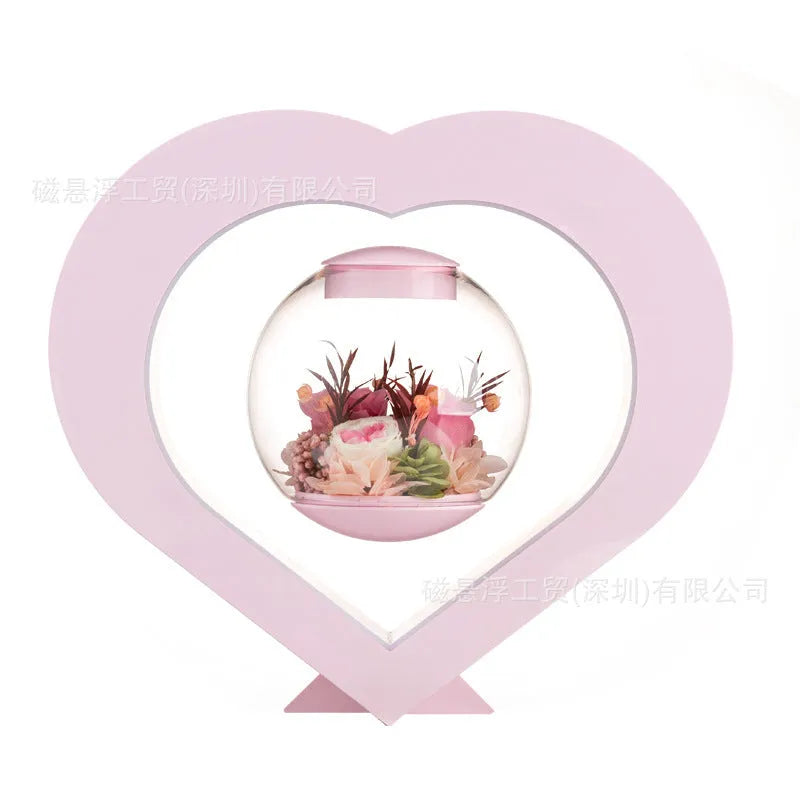 Pink preserved rose ornament with optional base and Bluetooth audio functionality for gift-giving
