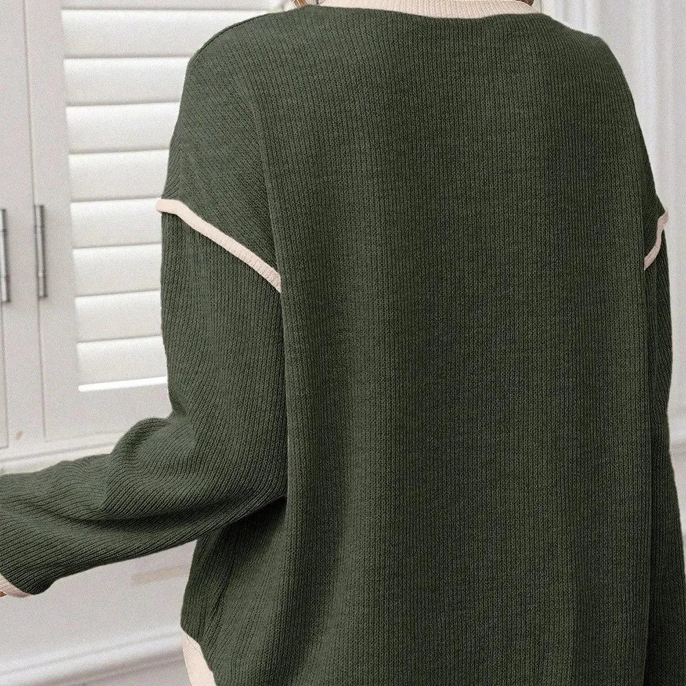 Women's loose-fit knit top with drop shoulders and four leaf clover pattern contrast trim