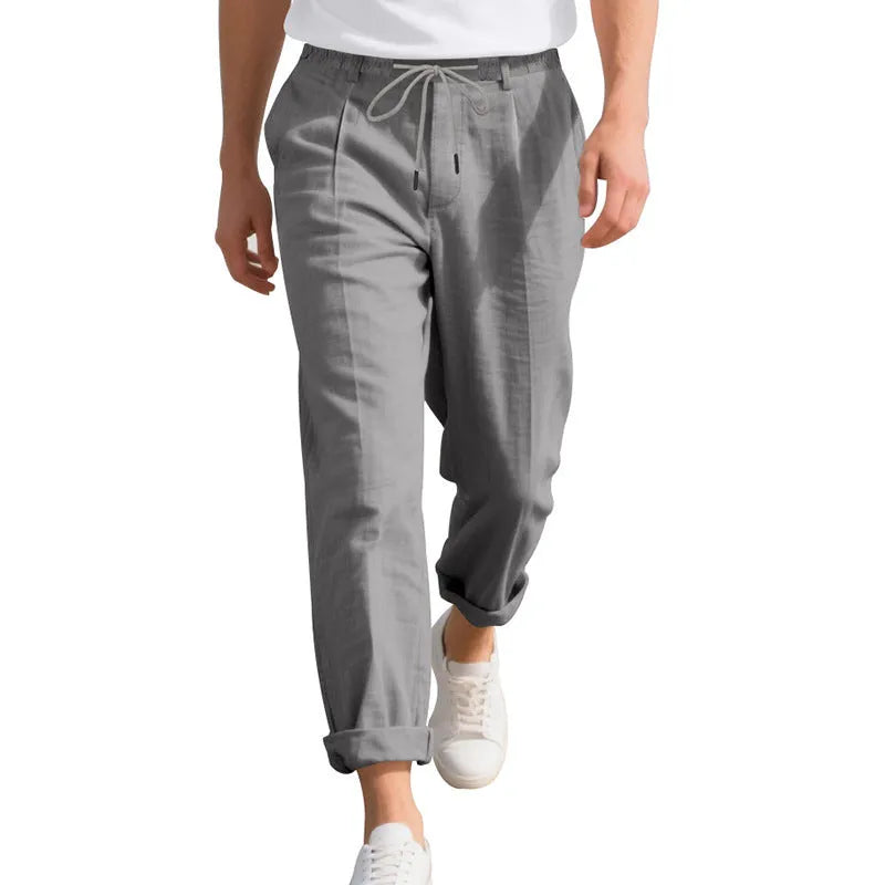Men's straight-leg linen casual trousers in light khaki colour with a drawstring waist.
