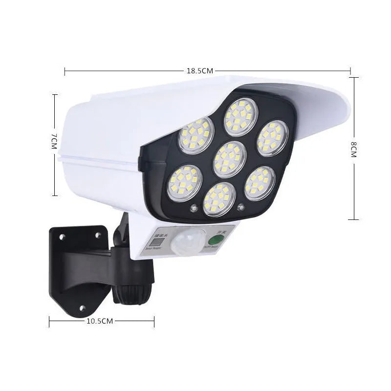 A modern, abstract-shaped solar-powered security light with LEDs, designed for outdoor wall mounting.