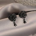 Black rose zircon stud earrings with flower shape and gold electroplated finish