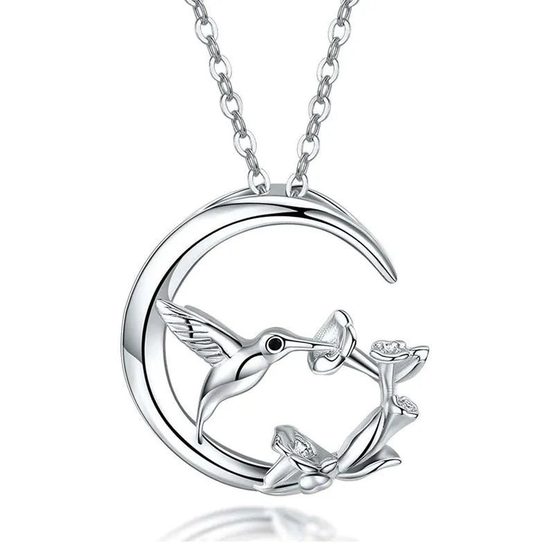 Copper necklace with morning glory blossom and hummingbird pendant in platinum tone on an O-link chain