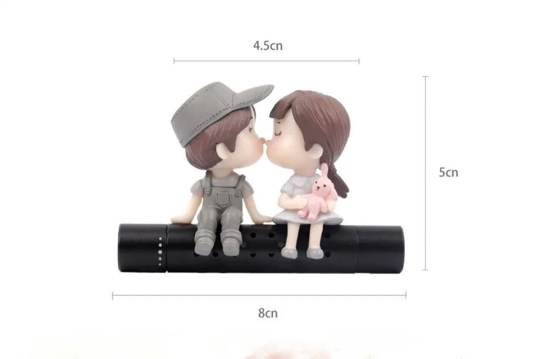 Cartoon couple car air outlet perfume clip in PVC and metal with included aroma stick, grey or blue option