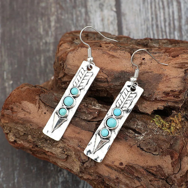 Silver geometric women's earrings with long strip design and inlaid turquoise detailing