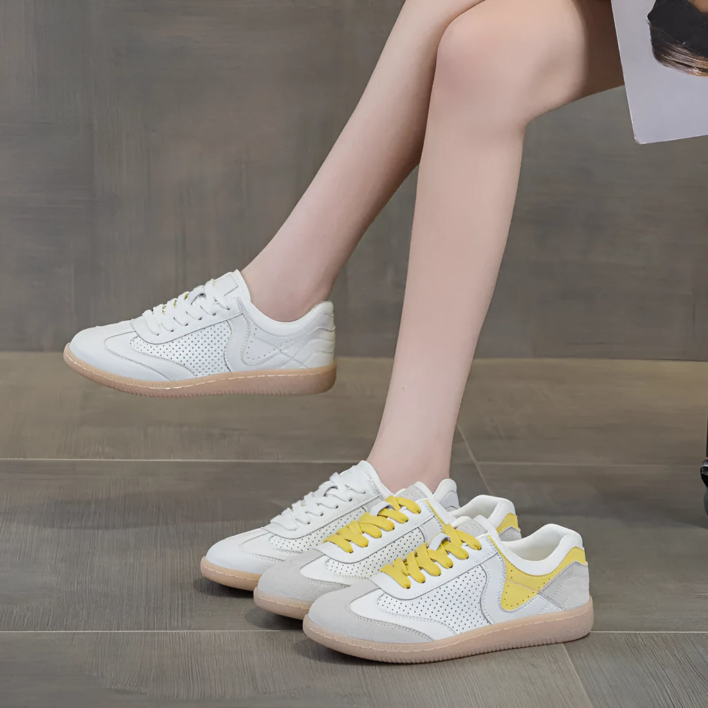 Breathable hollow casual shoes in white with cowhide upper, flat heel, and round toe